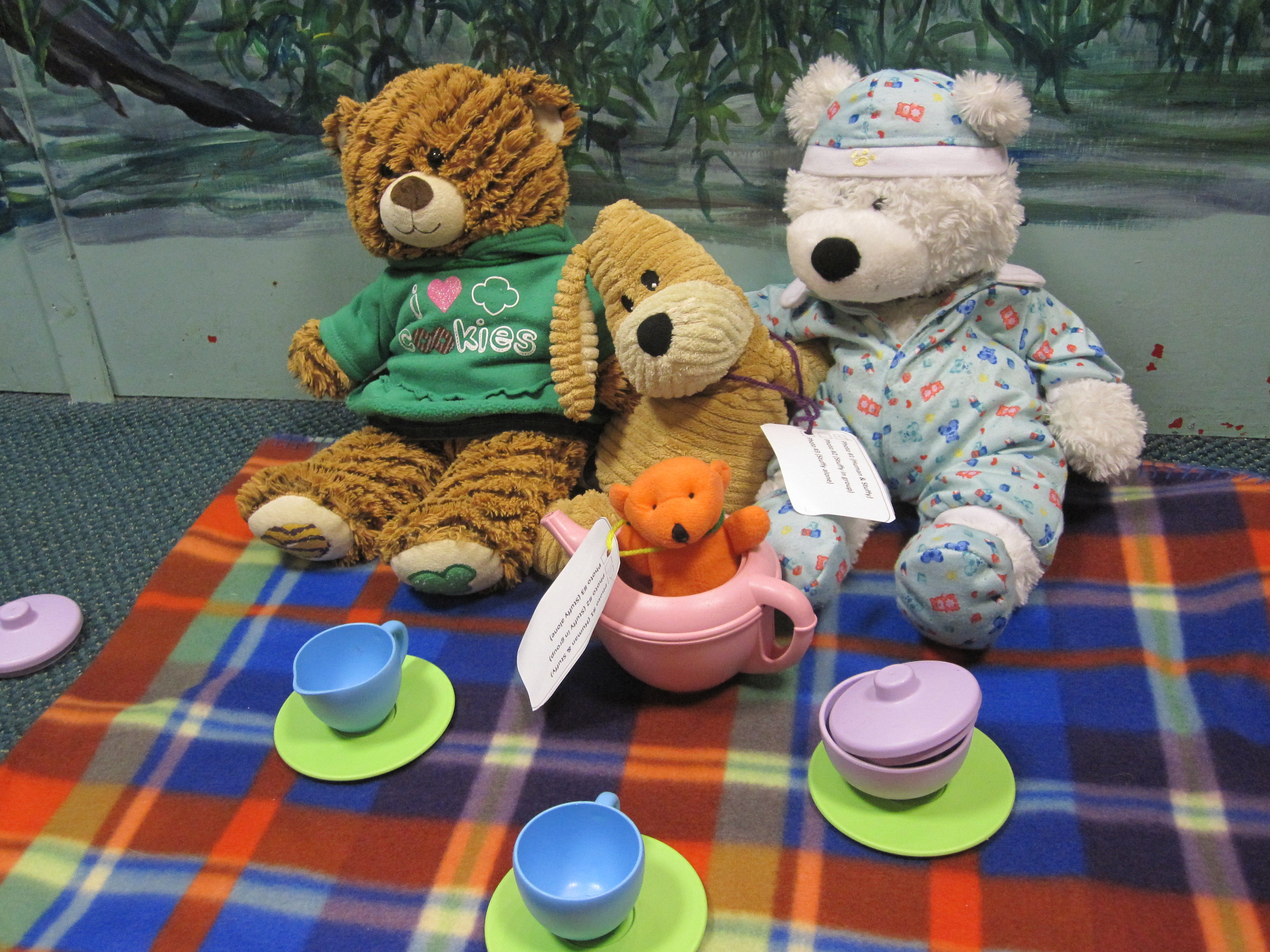 A group of stuffies having a tea party!